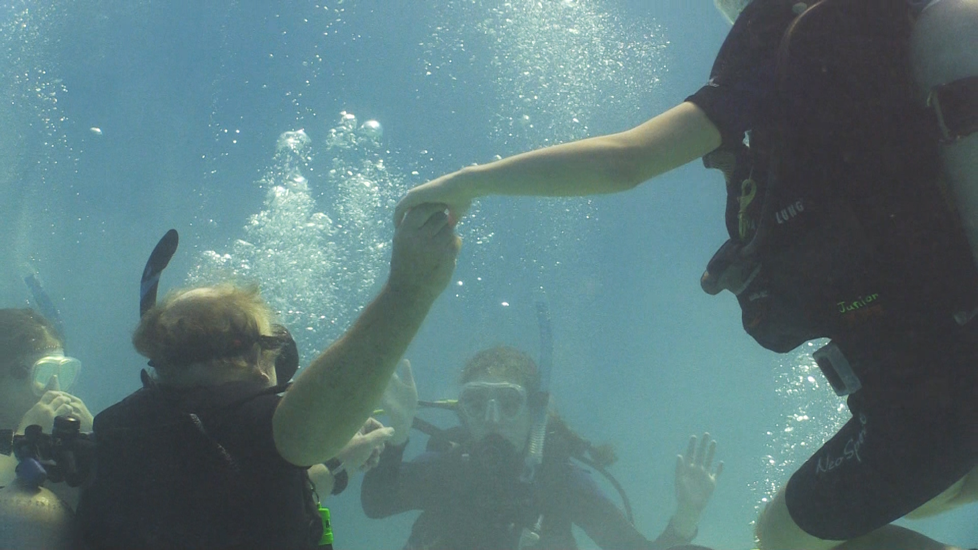 Tides students master their scuba skills in the pool.